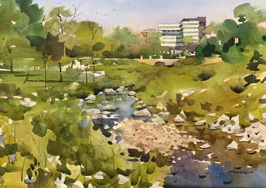 Plein air watercolor painting of wetland restored Doan Brook looking north at the VA Hospital.