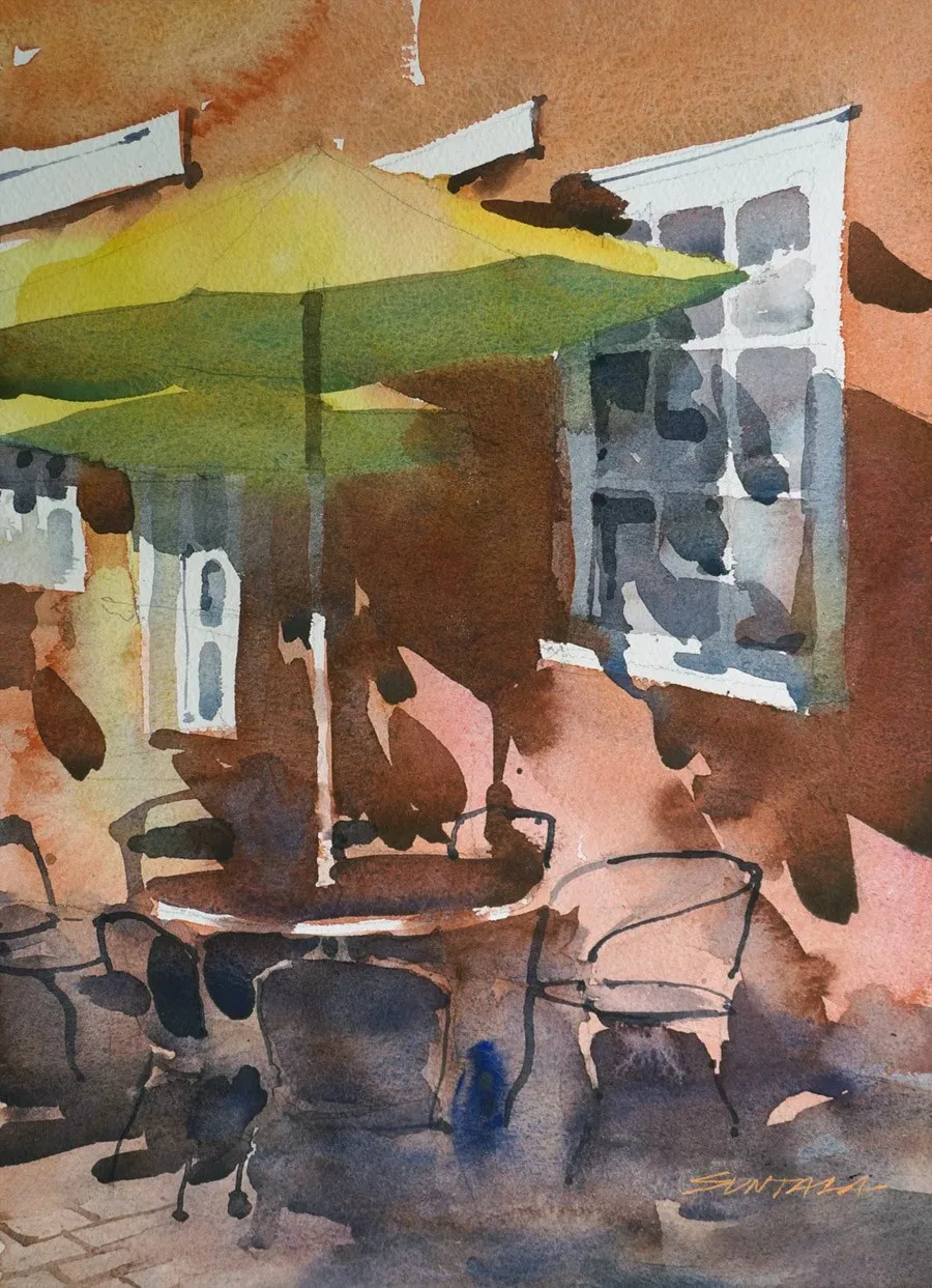 A large shadow is cast from yellow umbrellas in front of Clementine's in Olmsted Falls, OH