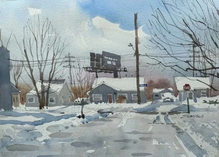 Snowy scene of view looking west on Mina Ave. with Eleanore Dr